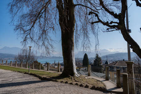 Lucerne, Switzerland, March 10, 2022 Lovely green park at the Musegg walls on a sunny dayのeditorial素材