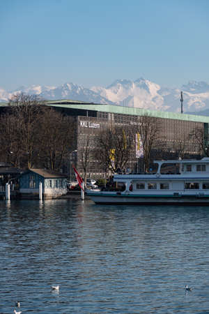 Lucerne, Switzerland, March 10, 2022 Little ship on the lake on a sunny day