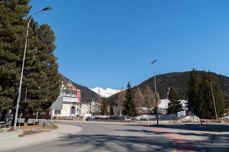 Davos, Switzerland, March 23, 2022 View over a street corner with the alps in the background in the...