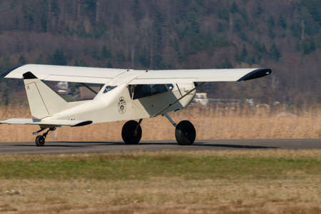 Wangen-Lachen, Switzerland, March 27, 2022 Groppo Trail propeller plane is taxiing to its take off position on a small airfieldのeditorial素材