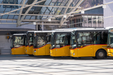 Chur, Switzerland, April 11, 2022 Local buses are parking at the main station in the city centerのeditorial素材