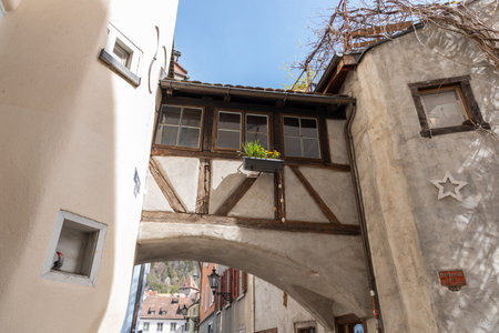 Chur, Switzerland, April 11, 2022 Traditional buildings in the historic old town on a sunny dayのeditorial素材