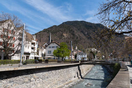 Chur, Switzerland, April 11, 2022 Waterfront at the Plessur river in the historic old town on a sunny dayのeditorial素材