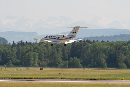 Zurich, Switzerland, May 20, 2022 Cessna 525 Citation Jet M2 on its final approach on runway 14