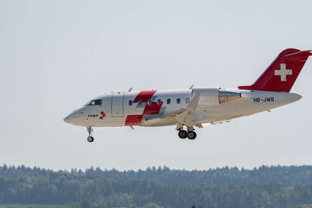 Zurich, Switzerland, May 20, 2022 Rega ambulance Bombardier CL-600-2B16 Challenger 650 aircraft on...