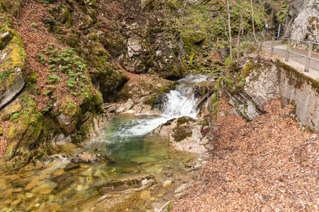 Unterwasser, Switzerland, May 5, 2022 Little alpine river flows along a canyon at the Thur waterfalls in spring timeの写真素材