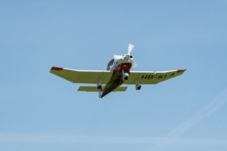 Lommis, Switzerland, May 11, 2022 Robin DR401-155CDI propeller plane is departing from a small airfieldのeditorial素材