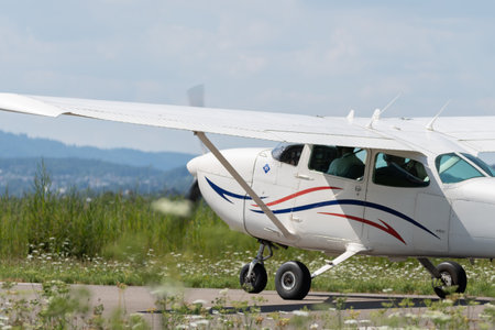 Wangen-Lachen, Switzerland, July 31, 2022 Reims Cessna 172P Skyhawk II propeller plane is landing on...