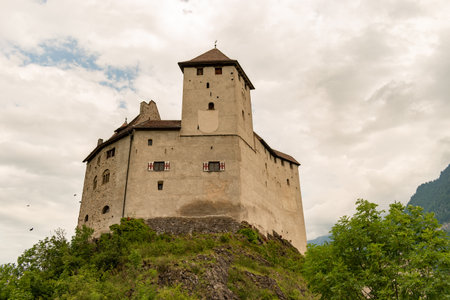 Balzers, Liechtenstein, June 5, 2022 Historic old Gutenberg castle on a cloudy dayのeditorial素材