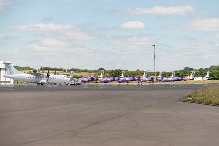 Saarbruecken, Germany, July 10, 2022 Bombardier DHC-8-402Q Dash 8 propeller aircraft at the parking areaのeditorial素材