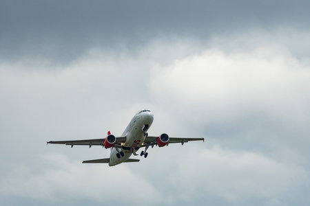 Zurich, Switzerland, September 27, 2022 Austrian airlines Airbus A320-214 aircraft is leaving from runway 32 on a cloudy dayのeditorial素材
