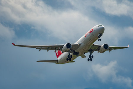 Zurich, Switzerland, September 27, 2022 Swiss international airlines Airbus A330-343 aircraft is departing from runway 32 on a cloudy dayのeditorial素材