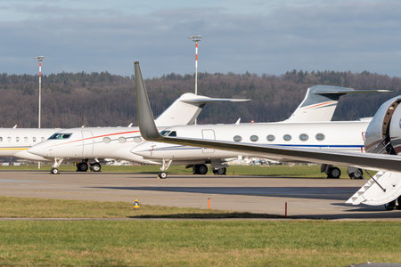 Zurich, Switzerland, January 19, 2023 Different Gulfstream business aircraft are parking on the...