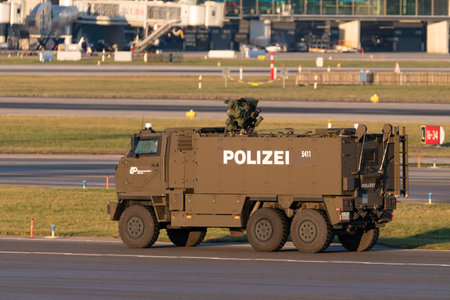 Zurich, Switzerland, January 19, 2023 Police truck is driving along the apron at the international...