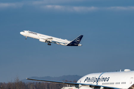 Zurich, Switzerland, January 20,2023 Lufthansa Airbus A321-231 aircraft is taking off behind a...