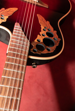 Vaduz, Liechtenstein, January 13, 2023 Product shot of an Ovation acoustic guitar in red