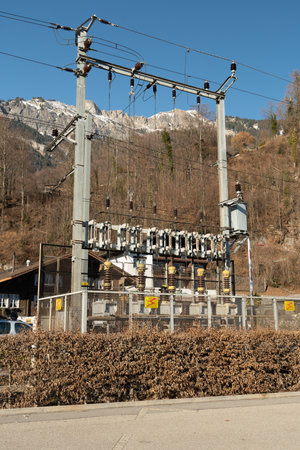 Brienz, Switzerland, February 10, 2023 Electric power station and an alpine scenery at the coast of the lake of Brienzのeditorial素材