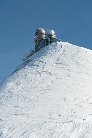 Jungfraujoch, Canton Bern, Switzerland, February 11, 2023 Building of the Sphinx observatory on a sunny dayのeditorial素材