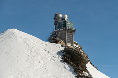 Jungfraujoch, Canton Bern, Switzerland, February 11, 2023 Building of the Sphinx observatory on a sunny dayのeditorial素材