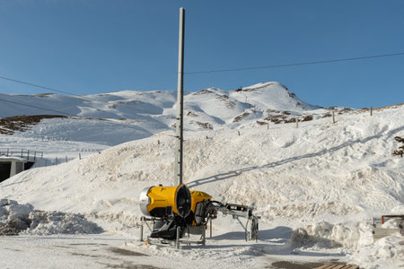 Kleine Scheidegg, Canton Bern, Switzerland, February 11, 2023 Snow canon is parked at the edge in the winter timeのeditorial素材