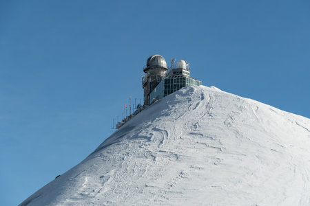 Jungfraujoch, Canton Bern, Switzerland, February 11, 2023 Building of the Sphinx observatory on a sunny dayのeditorial素材