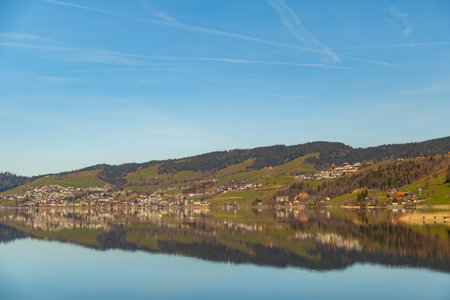 Fantastic landscape panorama at the Aegerisee on a sunny dayの写真素材