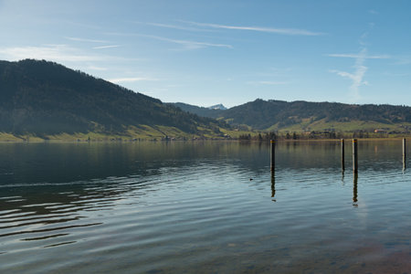 Magnificent landscape scenery at the lake of Aegerisee on a sunny dayの写真素材
