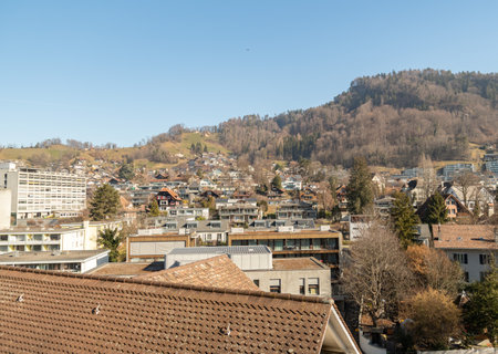 Fantastic view over the city in an alpine scenery on a sunny day