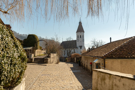 Thun, Switzerland, February 13, 2023 Historic old city church in the center on a sunny dayの写真素材