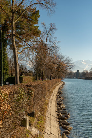 Thun, Switzerland, February 13, 2023 Water promenade at the lake of Thun on a sunny dayの写真素材