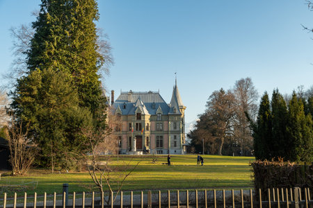 Thun, Switzerland, February 12, 2023 Historic old castle Schadau in a lovely park on a sunny dayのeditorial素材