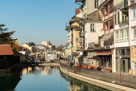 Thun, Switzerland, February 13, 2023 Waterfront along the Aare river in the city centerのeditorial素材