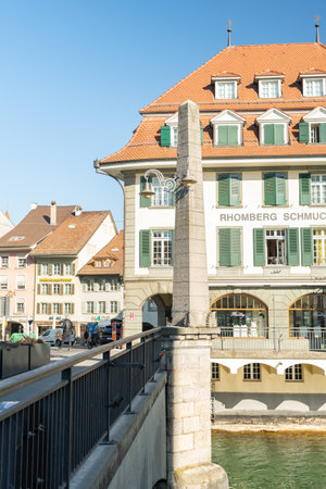 Thun, Switzerland, February 13, 2023 Little square along the waterfront in the city center on a sunny dayのeditorial素材