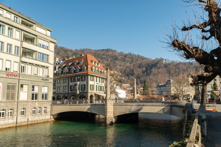 Thun, Switzerland, February 13, 2023 Waterfront along the Aare river in the city centerのeditorial素材