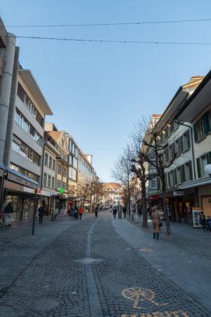 Thun, Switzerland, February 13, 2023 Popular shopping street in the city center on a sunny dayのeditorial素材