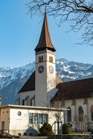 Interlaken, Switzerland, February 10, 2023 Historic old catholic church in the city centerの写真素材