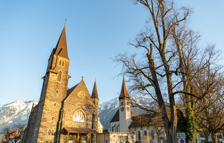Interlaken, Switzerland, February 10, 2023 Historic old catholic church in the city centerの写真素材