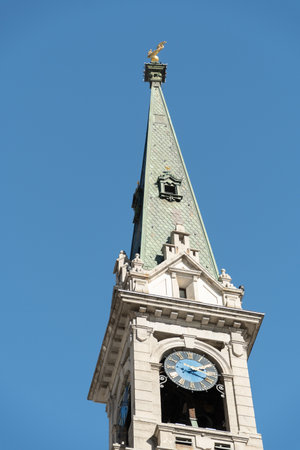 Saint Moritz, Switzerland, February 21, 2023 Tower of the historic reformed church in the city centerの写真素材