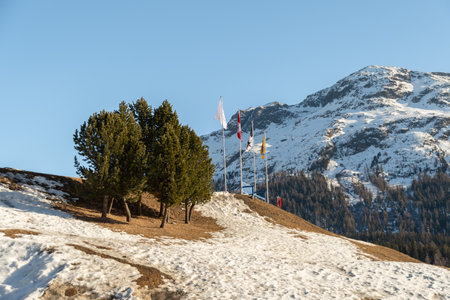 Saint Moritz, Switzerland, February 21, 2023 Winter wonderland at the coast of the frozen lake on a...