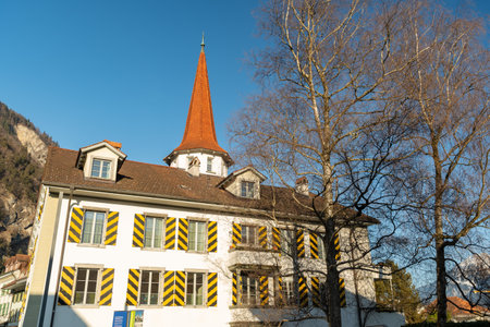 Interlaken, Switzerland, February 10, 2023 Historic old town with traditional buildings on a sunny dayのeditorial素材