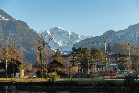 Interlaken, Switzerland, February 10, 2023 Alpine scenery at the river promenade in the city centerのeditorial素材