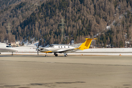 Samedan, Switzerland, February 21, 2023 Pilatus PC-12 NGX propeller aircraft on the apronのeditorial素材