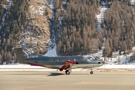 Samedan, Switzerland, February 21, 2023 Pilatus PC-12-47 propeller plane on the apronのeditorial素材