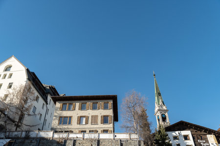 Saint Moritz, Switzerland, February 21, 2023 Modern buildings and scenery from the city center on a sunny dayのeditorial素材