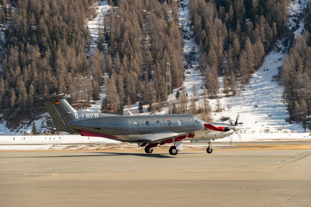 Samedan, Switzerland, February 21, 2023 Pilatus PC-12-47 propeller plane on the apronのeditorial素材