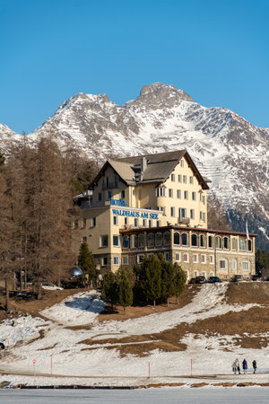 Saint Moritz, Switzerland, February 21, 2023 Building of the hotel Waldhaus am See on a little hillのeditorial素材