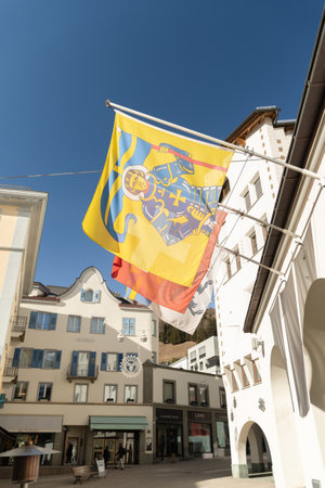 Saint Moritz, Switzerland, February 21, 2023 Local flags in front of the UBS Bank buildingのeditorial素材