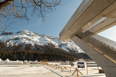 Saint Moritz, Switzerland, February 21, 2023 Platform for tourists to spot over the frozen lake on a sunny dayのeditorial素材