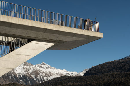 Saint Moritz, Switzerland, February 21, 2023 Platform for tourists to spot over the frozen lake on a sunny dayのeditorial素材