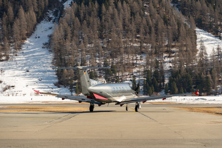 Samedan, Switzerland, February 21, 2023 Pilatus PC-12-47 propeller plane on the apronのeditorial素材